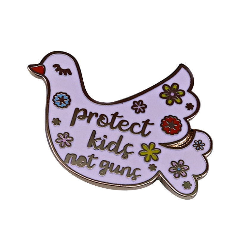 white dovve with flowers that says protect kids not guns