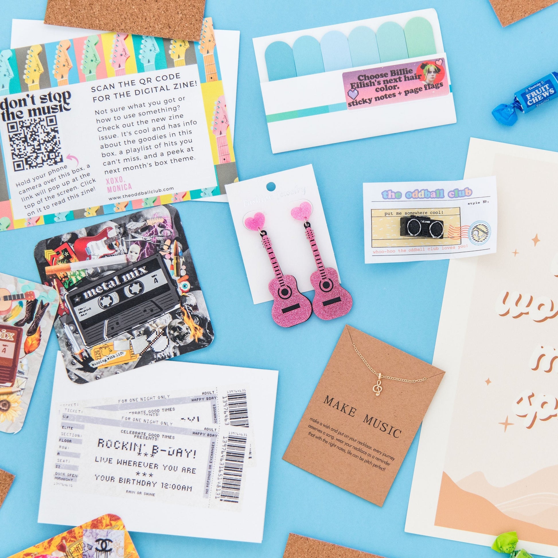 Add a pop of color and music to your look with this unique music note necklace, paper coasters, art print, stereo pin, and page flags.