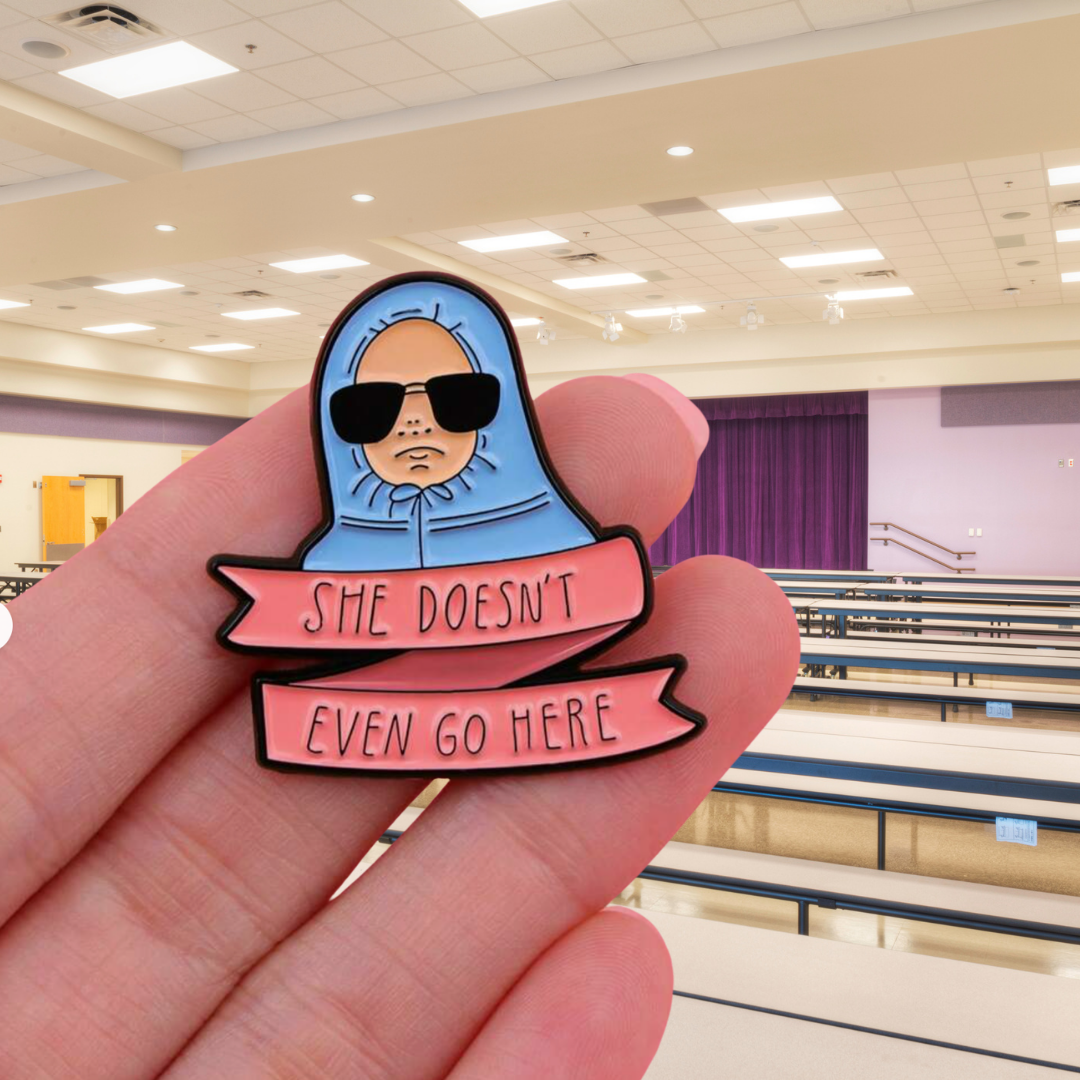 She Doesn't Even Go Here! Funny, Nostalgic, and Classic Pop Culture Hoodie Y2K Movie Quote Enamel Pin and Lapel Badge for Fans