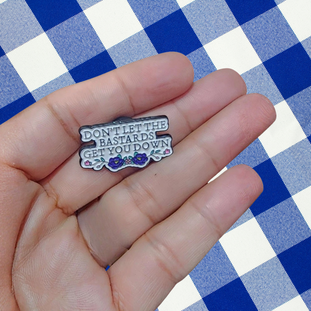 Don't Let the Bastards Get You Down - Motivational Feminist Empowerment & Resilience Jewelry - Nolite Te Bastardes Carborundorum Quote inspired literary quote Enamel Badge and Lapel Pin
