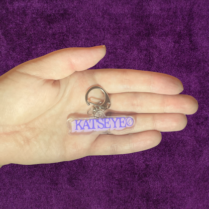Global Katseye K-Pop Girl Group Star Purple Eye with a Cute Y2K Aesthetic Acrylic Keychain Soft Is Strong Inspired Charm