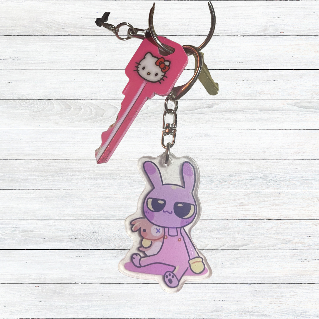 Purple Rabbit Acrylic Charm or Keychain a Chaotic Cartoon Jester with a Retro 90s CGI Aesthetic and Weirdcore & Kidcore Bag Accessory for Fans