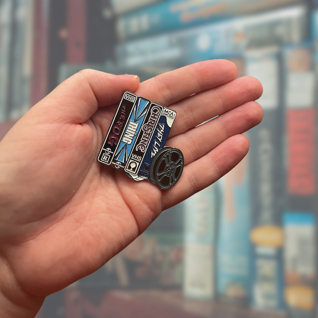 Movie Night 80s Retro VHS or video Rental Stack from a Nostalgic Tape Collection with a nod to Horror and Be Kind Please Rewind Era Enamel Pin Lapel Badge for Film Buffs & 80s Kids