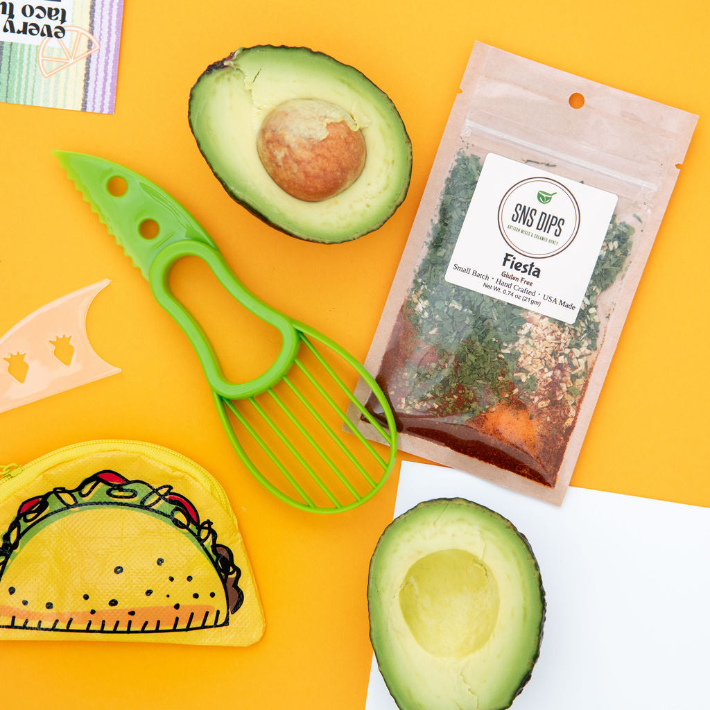 Make your fiesta Friday or taco night complete with an avocado pitter, SNS fiesta dip packet, and taco coin purse subscription box