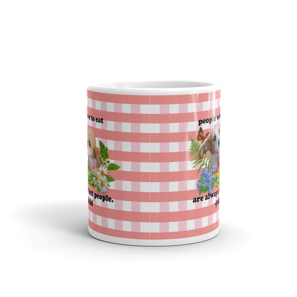 A mug with red plaid and a quote from Julia Child "people who love to eat are always the best people" with two doggies licking up an ice cream treat sourrounded by flowers, leaves, ferns, and an orange butterfly